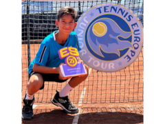 Daniel Stoyanov with a tennis trophy